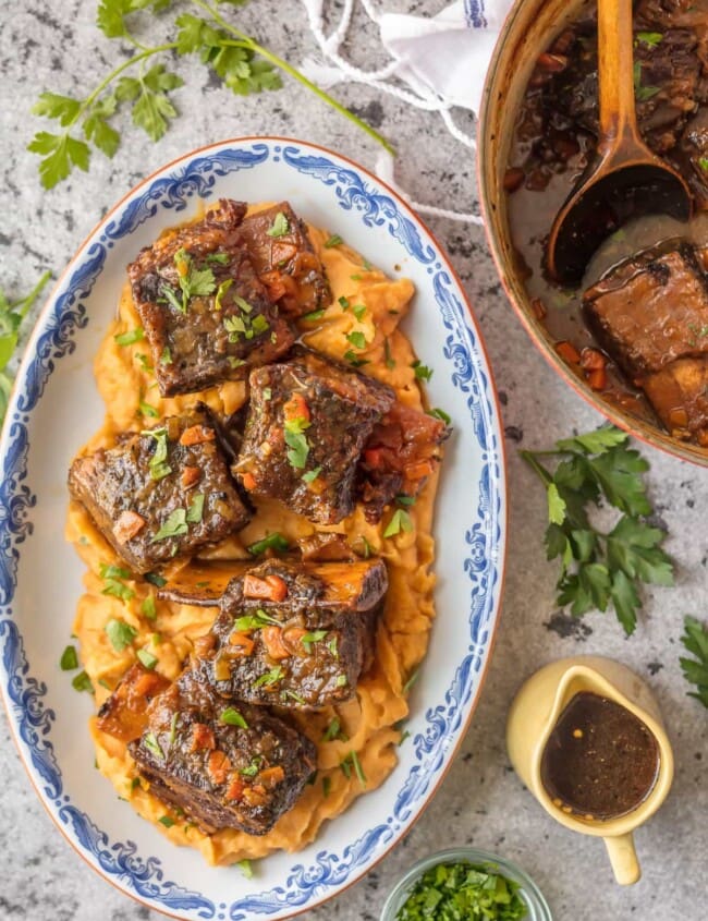 This Short Ribs Recipe (Honey Bourbon Dutch Oven Short Ribs) has quickly become one of our favorite dutch oven recipes! They're so tender and flavorful with this honey bourbon sauce.