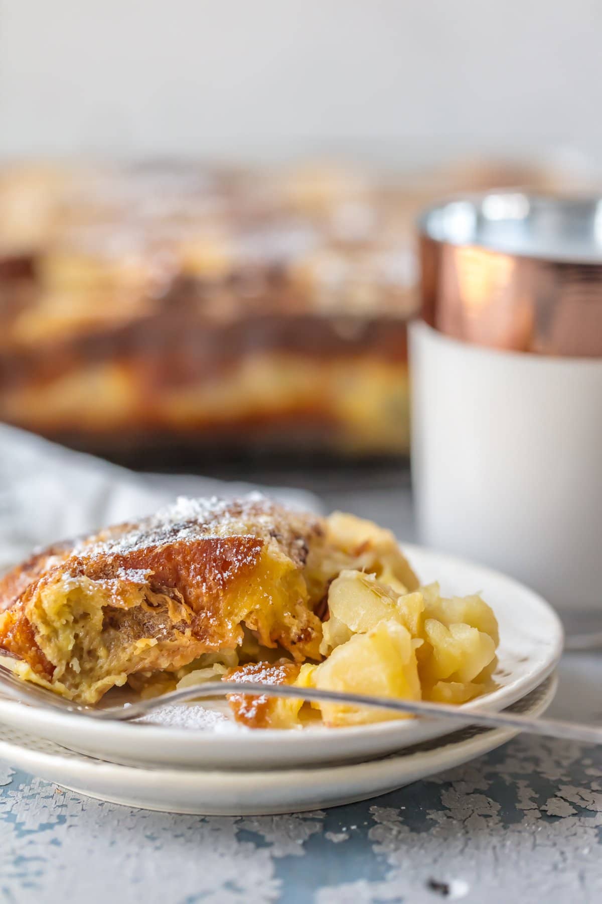 A plate of french toast casserole with apples