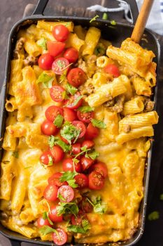 This BAKED MEXICAN MACARONI AND CHEESE can't be beat! No need to fool with a tricky cheese sauce when you have this secret ingredient making things extra creamy and delicious! Spicy sausage, green chiles, macaroni and cheese!