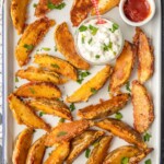 potato wedges on cookie sheet
