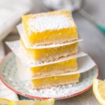 These GLUTEN FREE LEMON BARS are the easiest and best lemon bar recipe, and they just so happen to be gluten free! SO DELICIOUS! Thick and creamy lemon squares for the win.