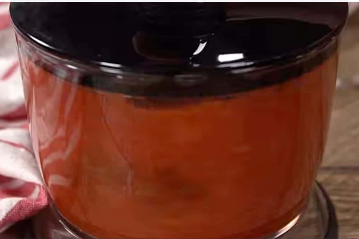 blend tomatoes and chipotle chilies in a blender