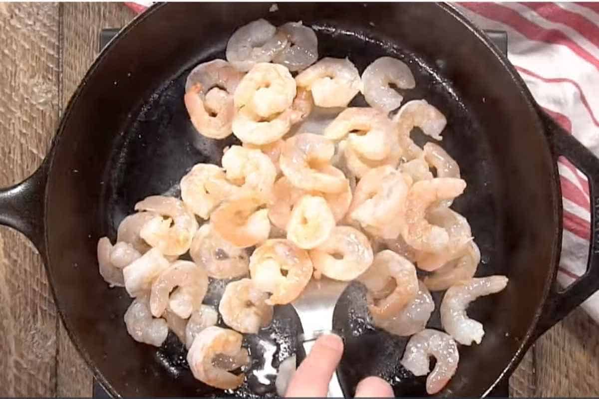 cooking deveined shrimps in a cast iron skillet