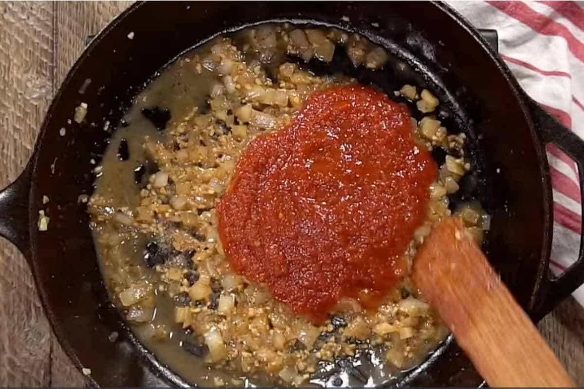 adding the tomato/chipotle sauce and cooking