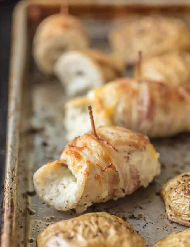 These CHEESY PANCETTA WRAPPED CHICKEN ROLLUPS are so quick and easy and delicious! Chicken stuffed with boursin cheese and wrapped in pancetta makes for the most moist and delicious chicken ever.