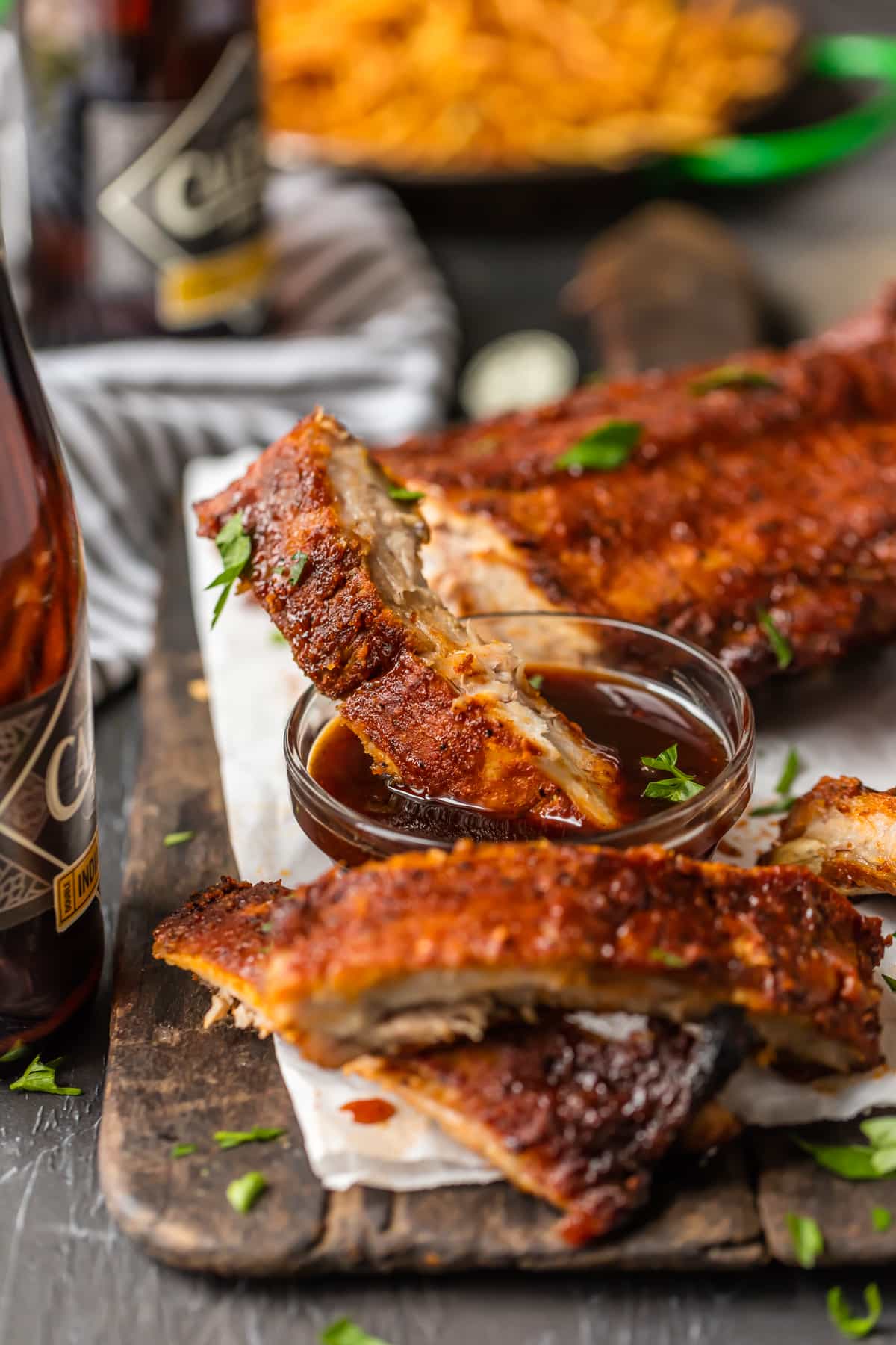 ribs dipped in BBQ sauce