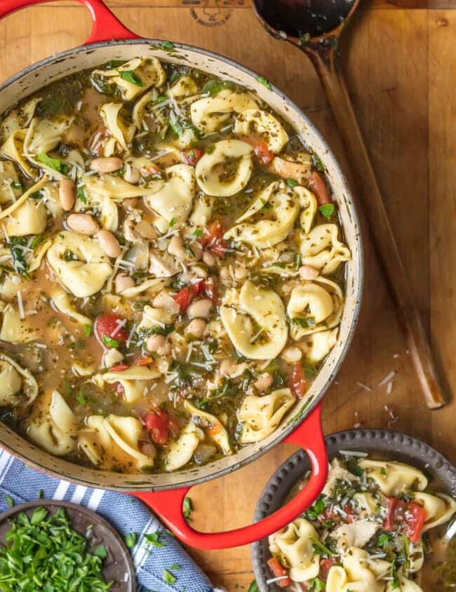 This Pesto Chicken Tortellini Soup recipe is the ultimate comfort food! Throw some amazing ingredients into a pot & you've got the best pesto tortellini soup.