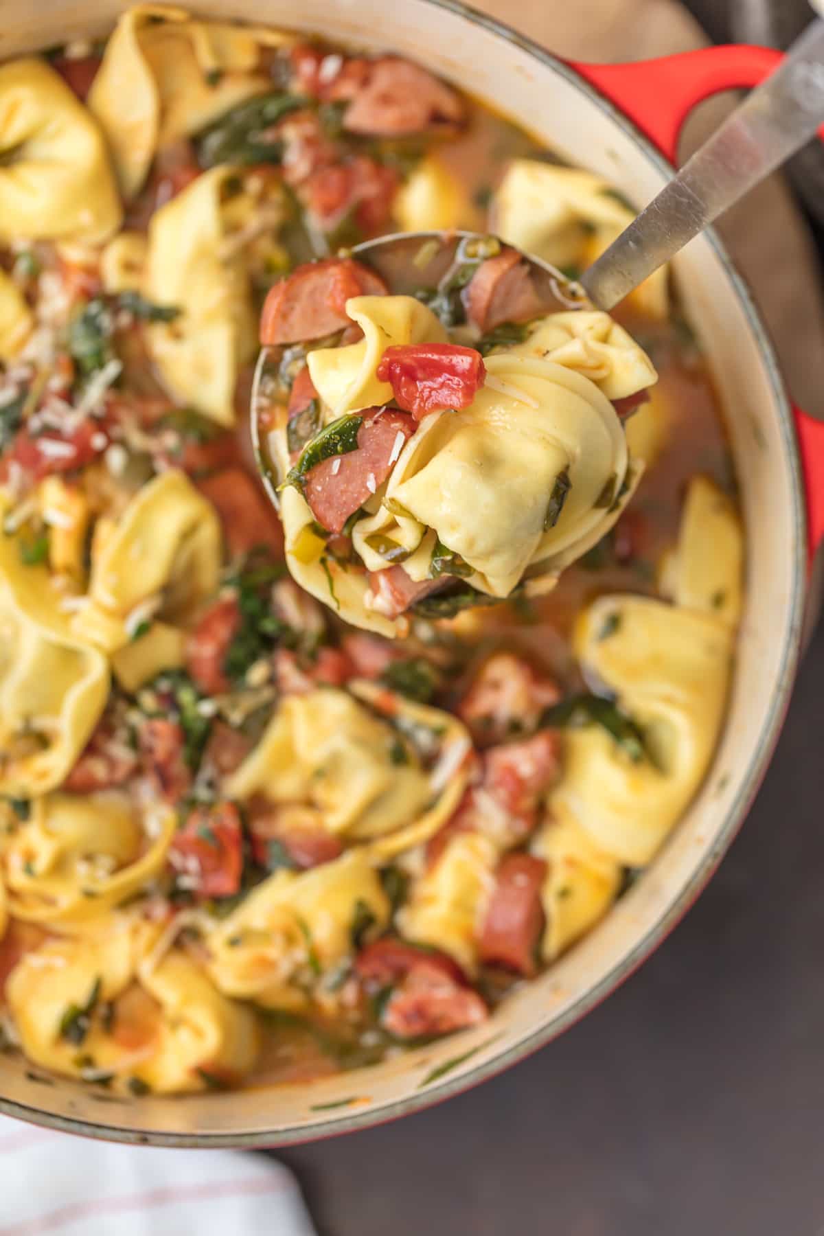 Tortellini vs Tortelloni: Tortelloni soup in large pot