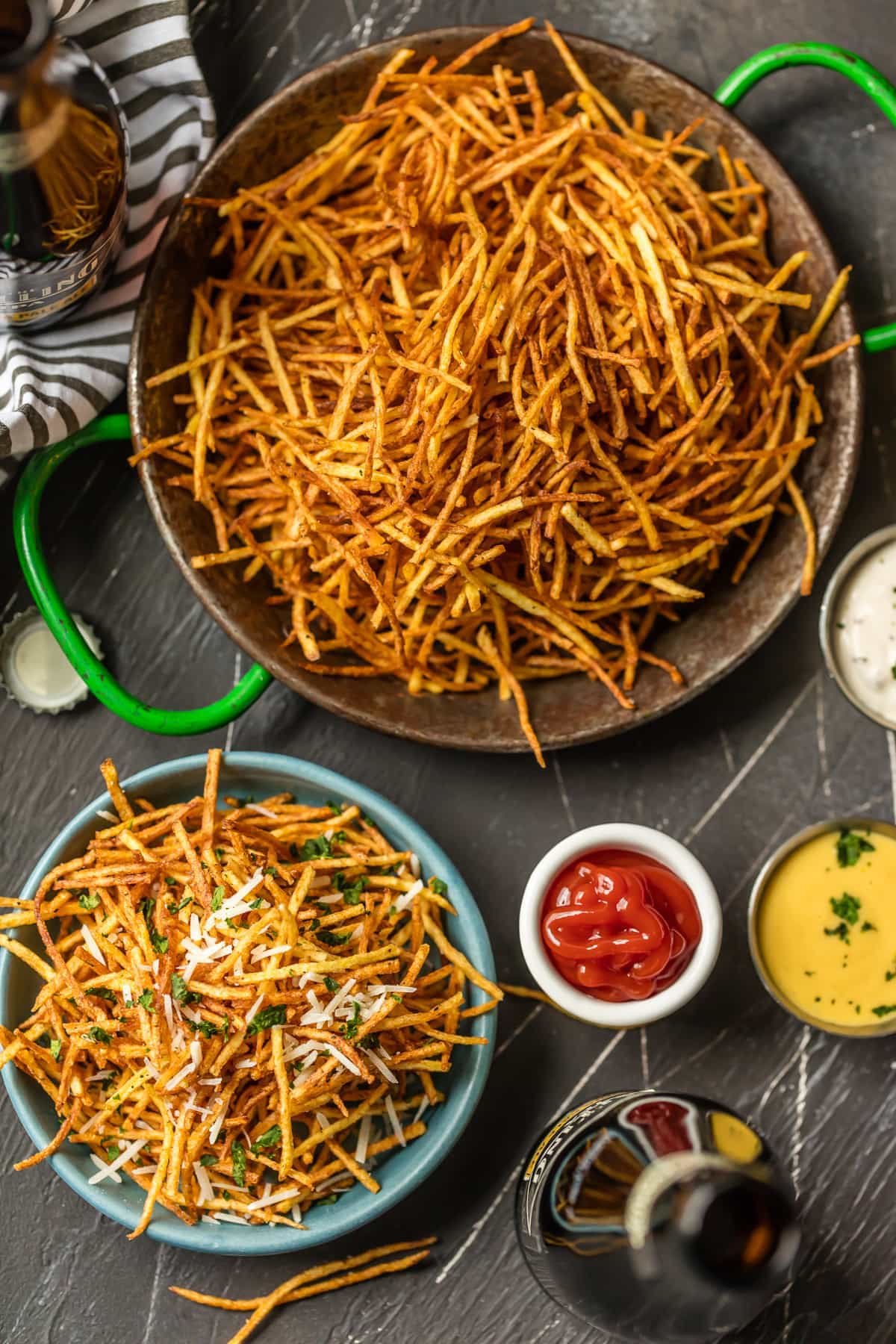 Shoestring Fries are the perfect side for sandwiches to bbq to so much more! We love these fun Shoestring Potatoes that are super thin and deep fried. They're crispy, customizable, and delicious. Once we show you how to make shoestring fries you'll never make fries the same way again. We love to make ours Garlic Parmesan Fries! So delicious and fun.