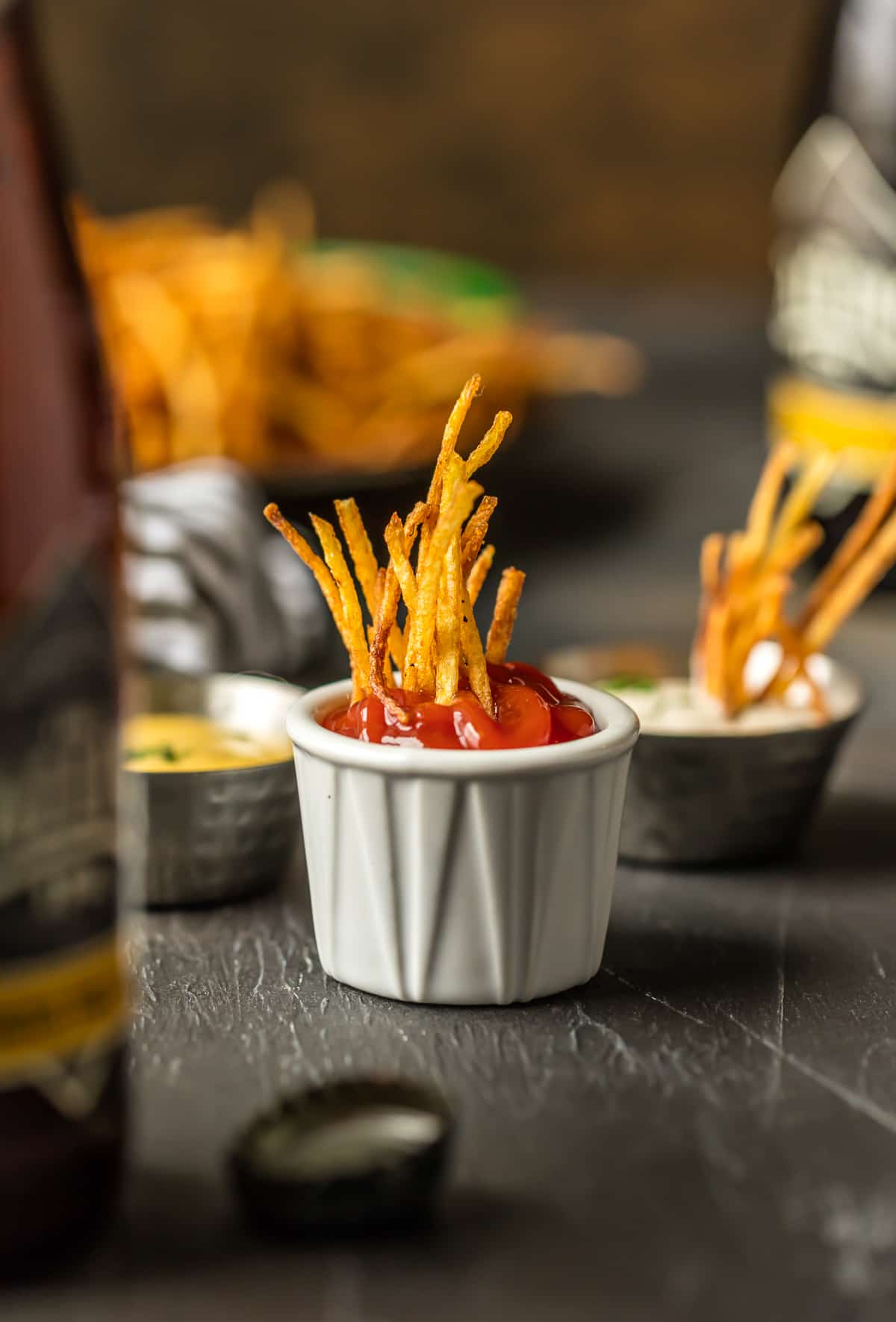 Shoestring Fries dipped in ketchup.