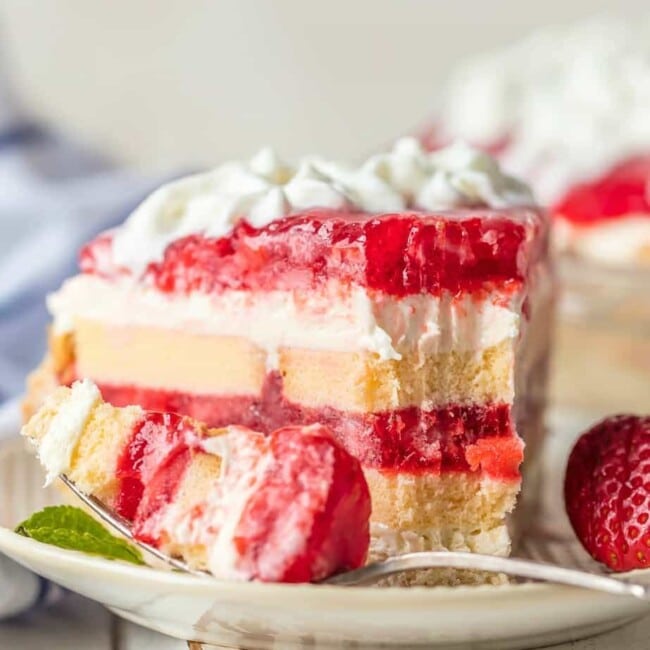 slice of strawberry shortcake pie on a plate with a fork