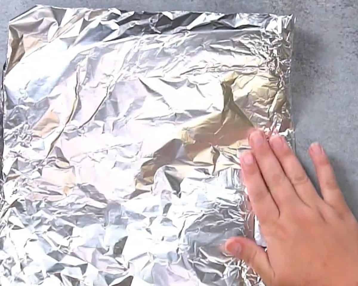 Folding the foil.