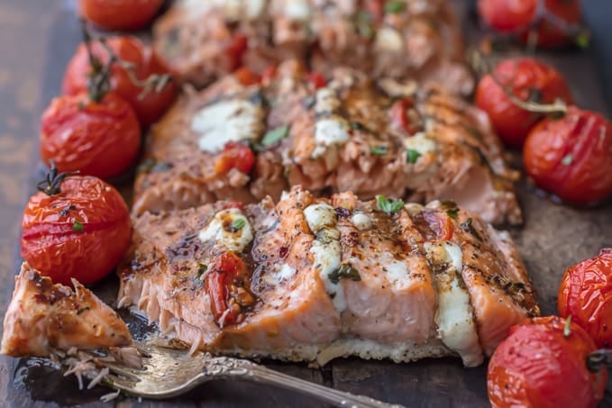 Salmon stuffed with mozzarella cheese and tomatoes