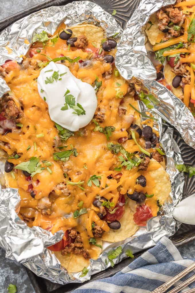 The BEST Nachos recipe, made in packets of aluminum foil in the oven or on the grill