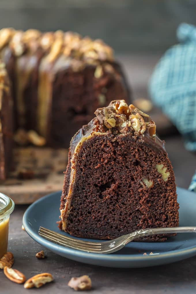 This TURTLE BROWNIE CAKE is a chocolate lovers dream. Dense and moist chocolate cake with walnuts and topped with the most incredible ganache and caramel drizzle. Crave worthy baking!