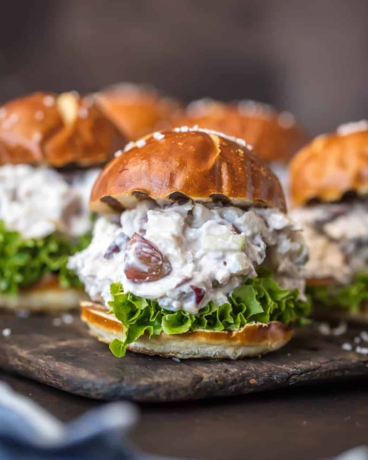 Healthy chicken salad slider with lettuce on a bun.