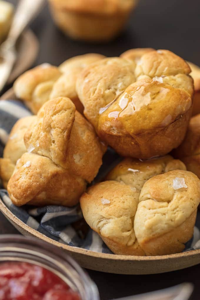 dinner rolls stacked in a serving bowl