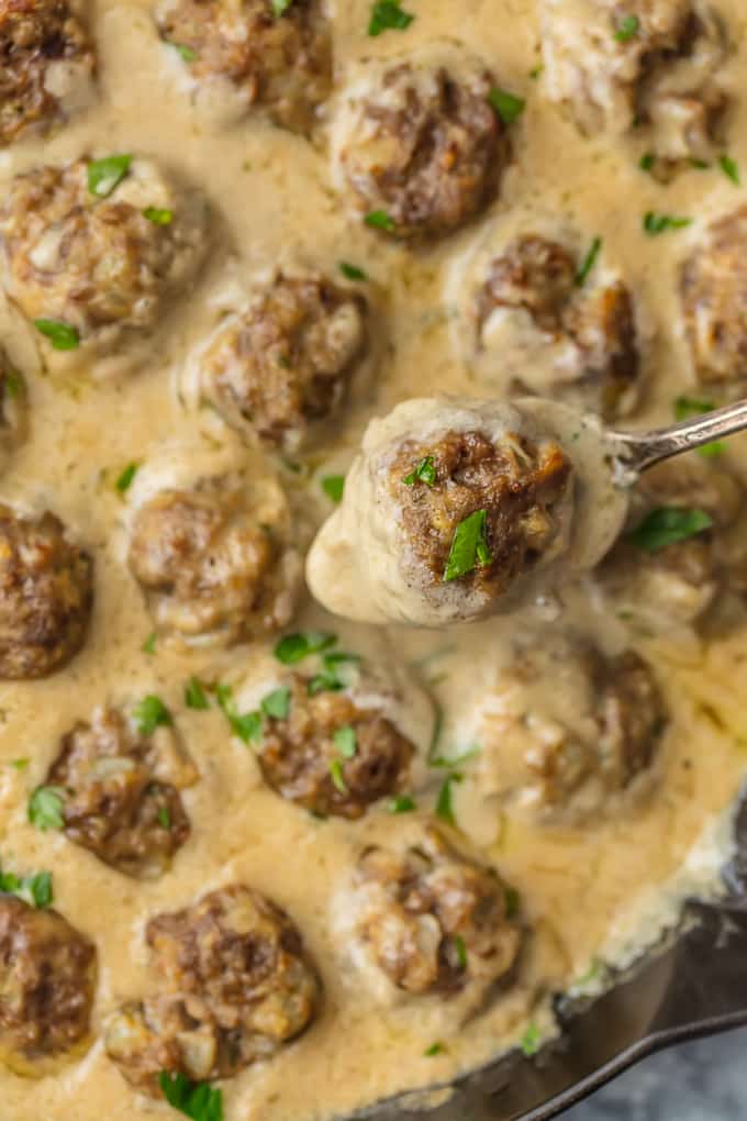Up close picture of swedish meatballs in skillet with sauce