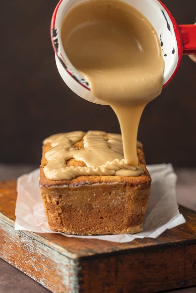 Pouring brown sugar icing onto an easy pound cake recipe