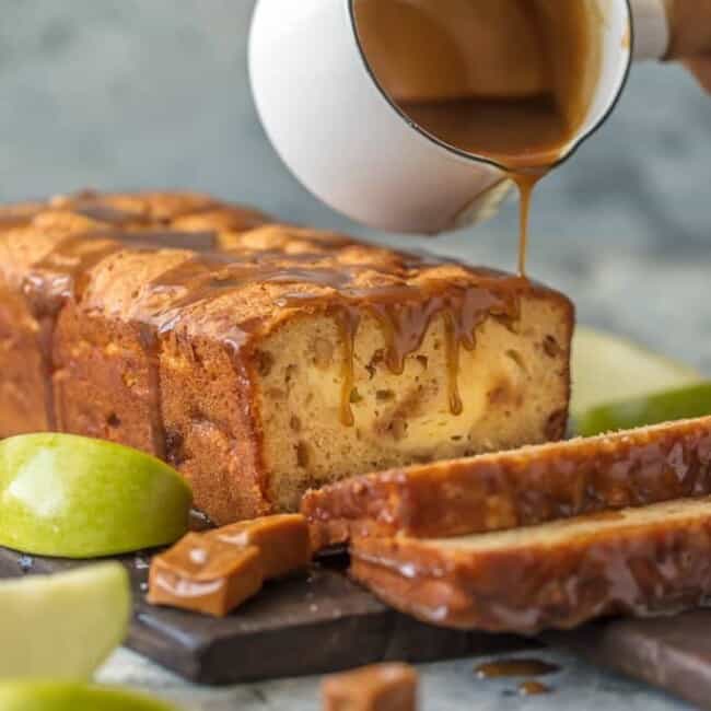 This CARAMEL CHEESECAKE STUFFED APPLE BREAD is a must make for Fall and the holidays. This moist apple bread is more like a chunky apple cake, stuffed with real apples, caramel pieces, and caramel cheesecake. OBSESSED.
