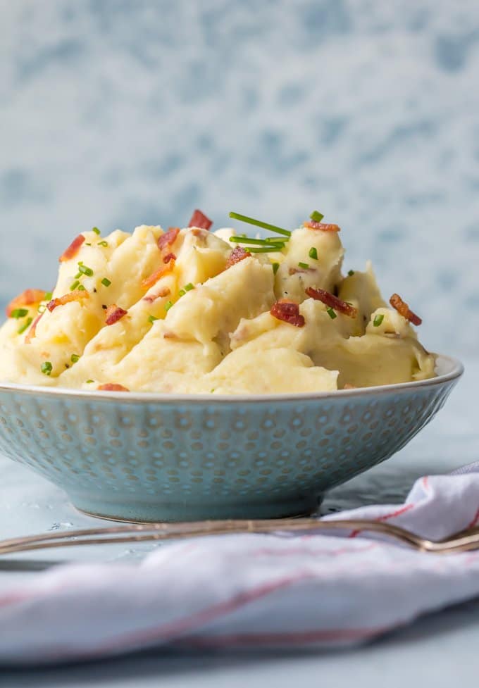 a bowl of cheesy mashed potatoes