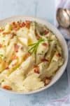 Every Thanksgiving table needs BACON GOAT CHEESE MASHED POTATOES! These are our favorite mashed potatoes and are always a crowd pleaser. So creamy, flavorful, and delicious. THE BEST cheesy mashed potato recipe!