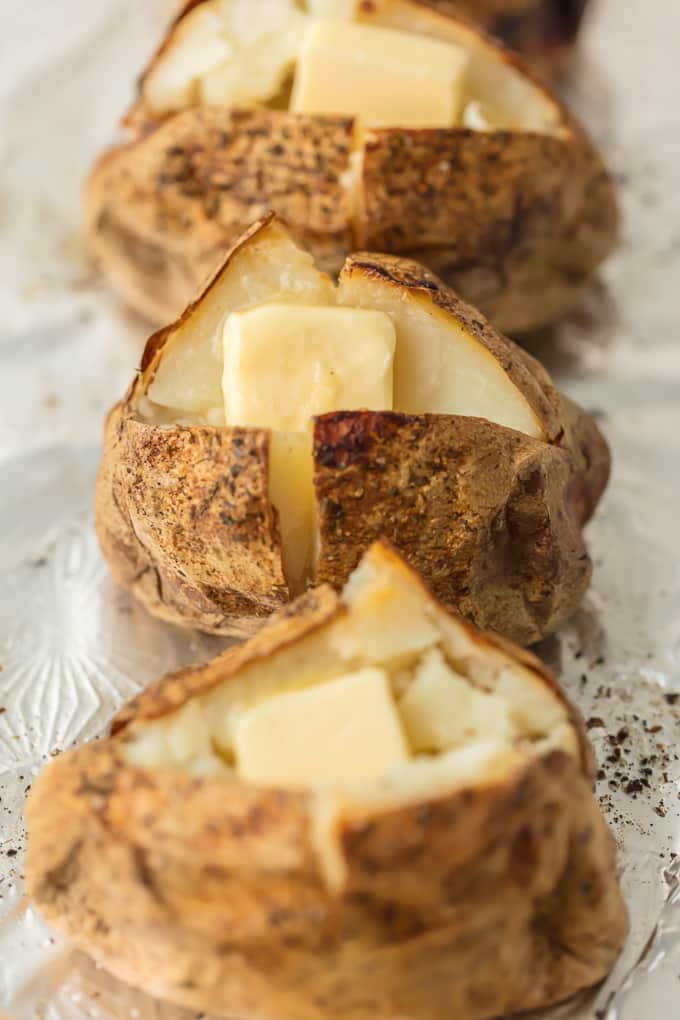 Everyone should know HOW TO COOK PERFECT BAKED POTATOES! These potatoes turn out tender, flavorful, and perfect every single time. Top with all the fixings and dig in!