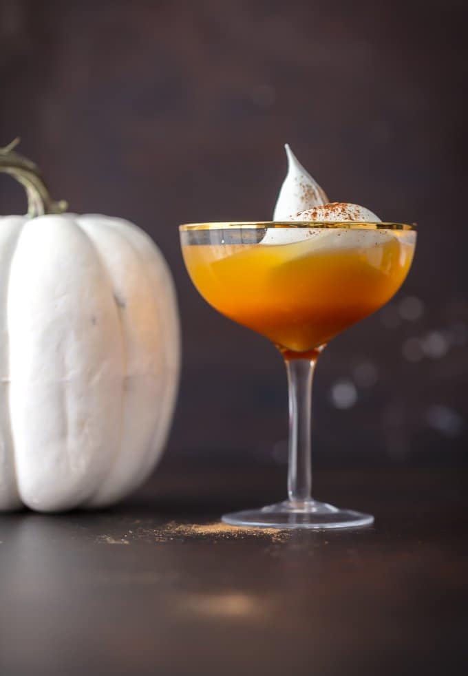This Pumpkin Punch recipe is the perfect Thanksgiving or Halloween Punch idea. A fun & tasty Pumpkin Cocktail inspired by pumpkin pie! A glass of pumpkin pie punch