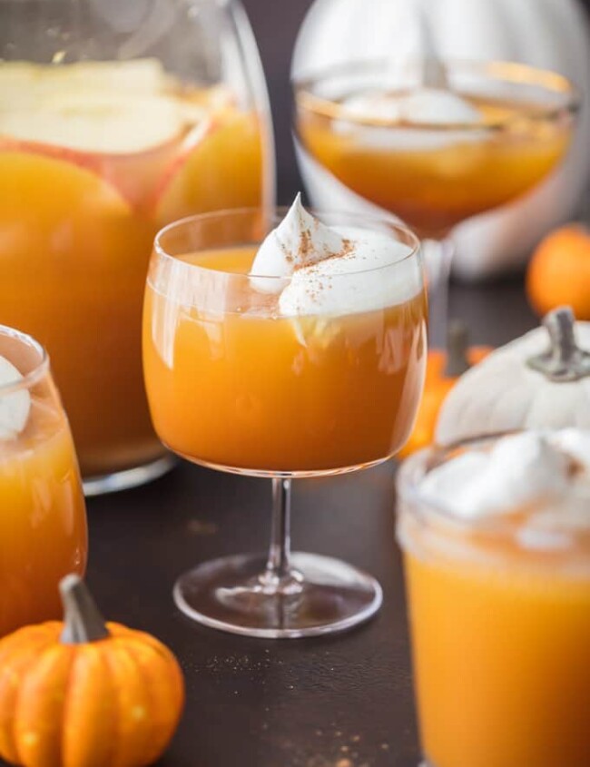 This Pumpkin Punch recipe is the perfect Thanksgiving or Halloween Punch idea. A fun & tasty Pumpkin Cocktail inspired by pumpkin pie!