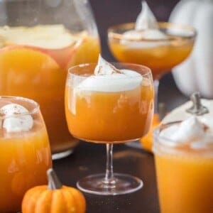 This PUMPKIN PIE PUNCH is the ultimate Thanksgiving cocktail! With apple cider, real pumpkin, and cream soda you'll never believe how tasty this party punch can be. Such a unique and fun holiday drink recipe.