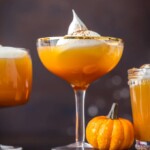 This PUMPKIN PIE PUNCH is the ultimate Thanksgiving cocktail! With apple cider, real pumpkin, and cream soda you'll never believe how tasty this party punch can be. Such a unique and fun holiday drink recipe.