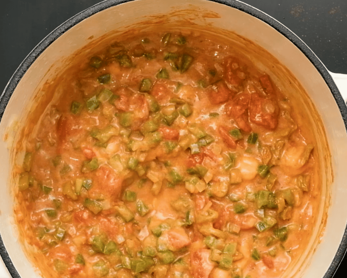 A pot of ingredients to make King Ranch chicken mac and cheese.