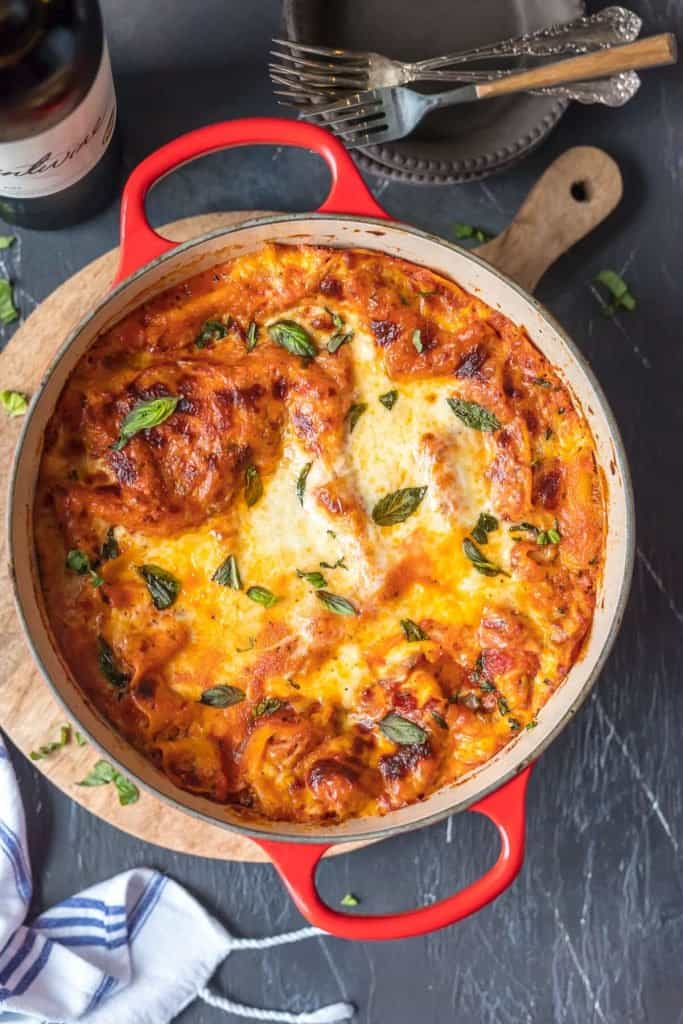 This Dutch Oven Lasagna recipe, or Stove Top Lasagna, will blow your mind! You'll never make a fully traditional lasagna recipe again after making this easy stove-top version. Easy dutch oven recipe to make lasagana