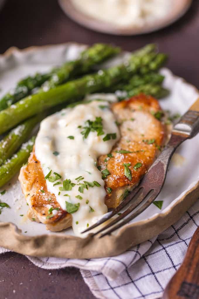 Parmesan Garlic Pork Chops with cream sauce