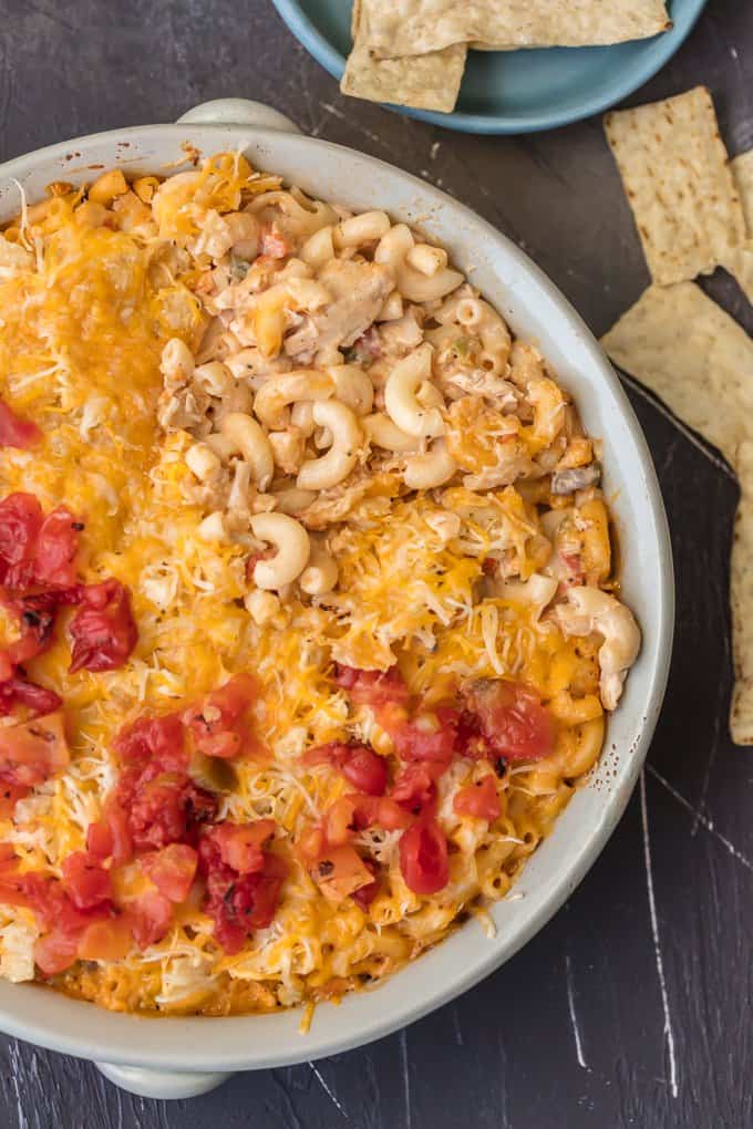 King Ranch Chicken recipe in a casserole dish, topped with cheese and tomatoes