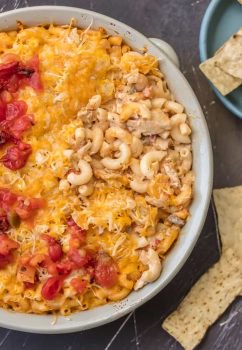 KING RANCH CHICKEN MAC AND CHEESE is a delicious twist on a classic. I wanted to make a fun King Ranch Chicken Recipe that's filled with all those amazing ingredients that I love. This Chicken Mac and Cheese Casserole is loaded with creamy cheese, spicy tomatoes, chunky chicken, and so much more. It will be a family favorite from the first time you make it.