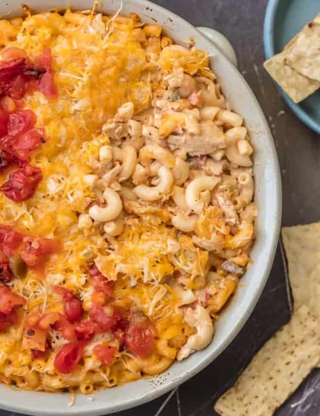 KING RANCH CHICKEN MAC AND CHEESE is a delicious twist on a classic. I wanted to make a fun King Ranch Chicken Recipe that's filled with all those amazing ingredients that I love. This Chicken Mac and Cheese Casserole is loaded with creamy cheese, spicy tomatoes, chunky chicken, and so much more. It will be a family favorite from the first time you make it. 