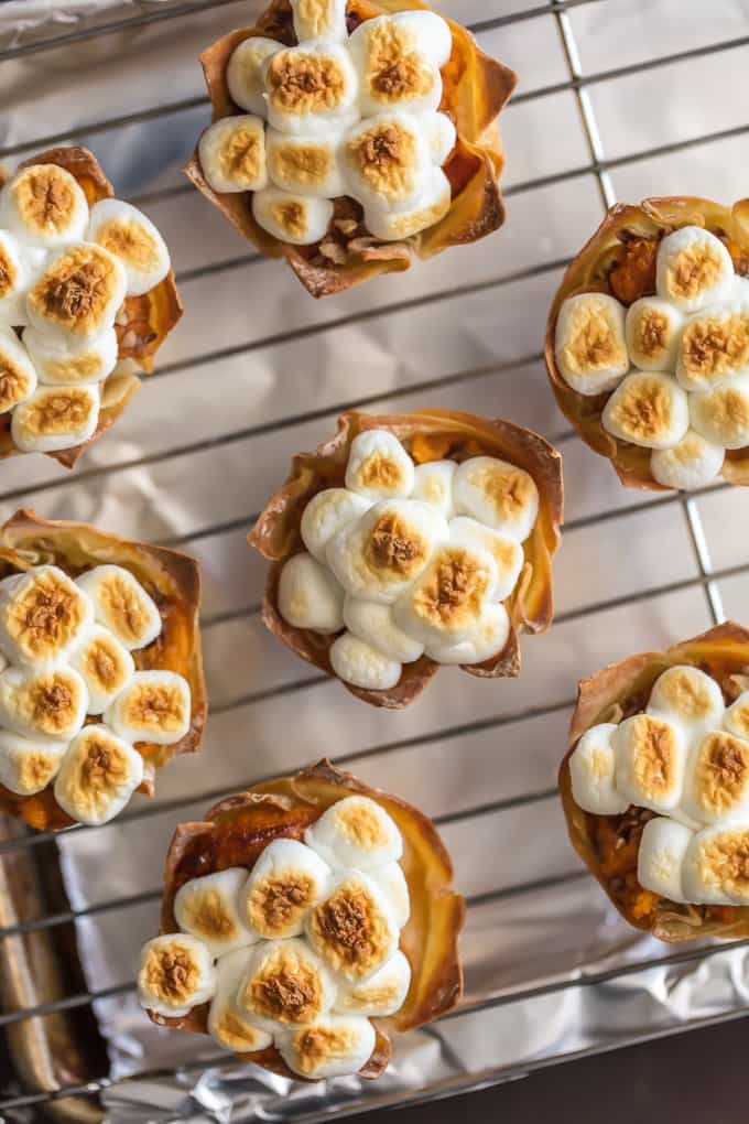 Wonton cups filled with sweet potato souffle and topped with toasted marshmallow 