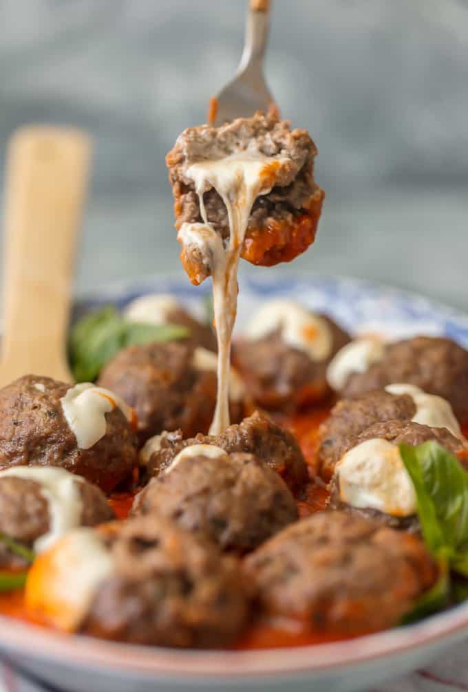 Mozzarella stuffed meatball on a fork