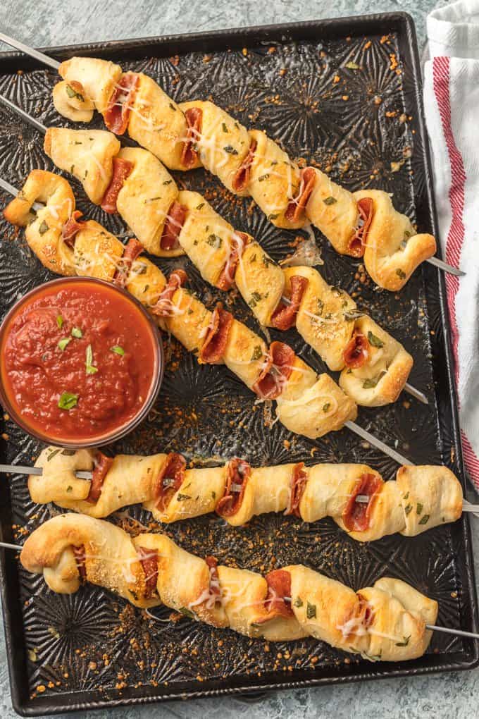 This PIZZA ON A STICK is always a hit with both kids and adults. We made ours pepperoni, but you can do any flavor combination! So fun and EASY!