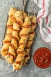 This PIZZA ON A STICK is always a hit with both kids and adults. We made ours pepperoni, but you can do any flavor combination! So fun and EASY!
