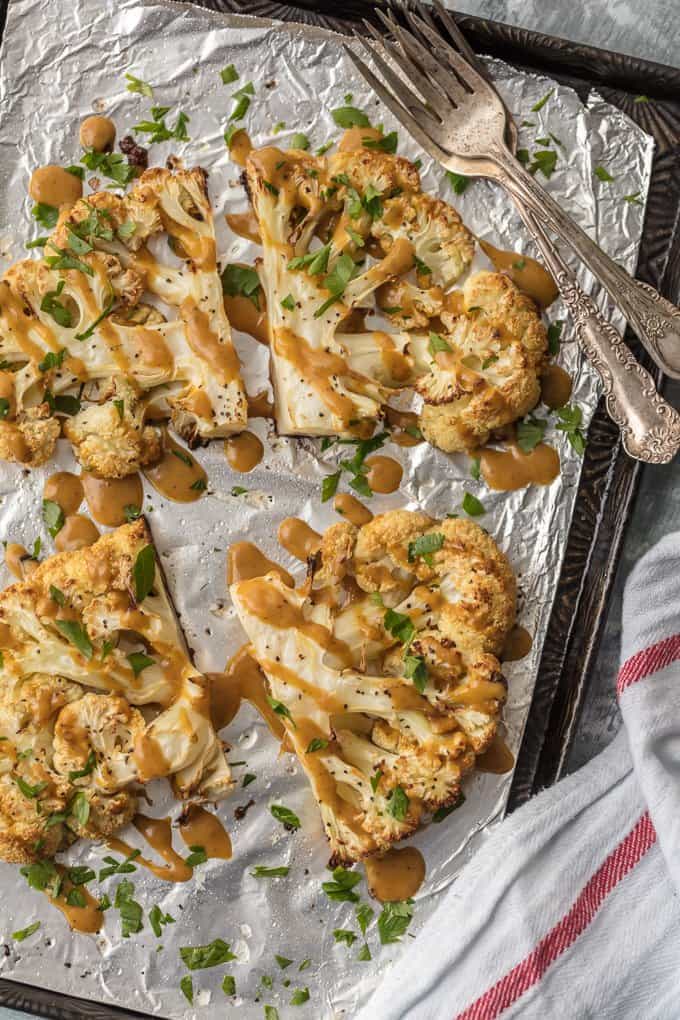 Cauliflower Steaks covered in a Thai Peanut Sauce