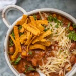 This REALLY GOOD VEGETARIAN CHILI will knock your meat loving socks off. This healthy chili has all the flavor and is made entirely of vegetables. SO GOOD.