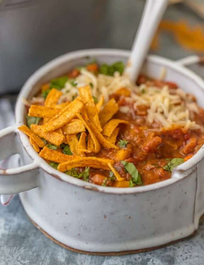 This REALLY GOOD VEGETARIAN CHILI will knock your meat loving socks off. This healthy chili has all the flavor and is made entirely of vegetables. SO GOOD.