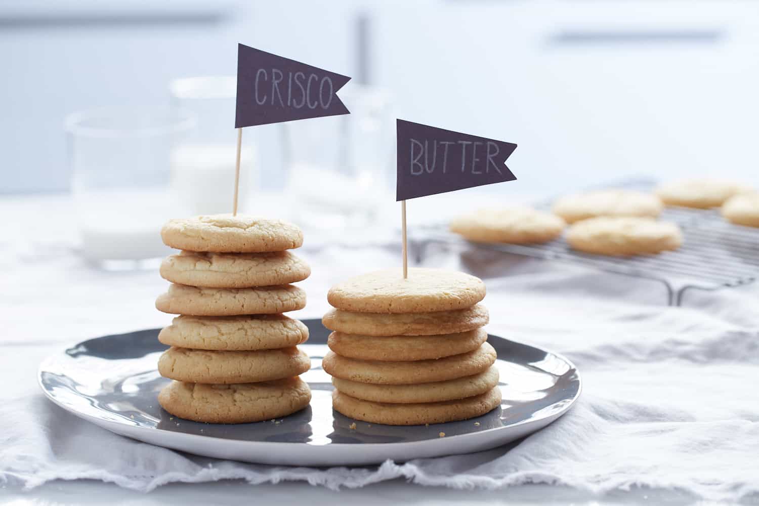 plate of sugar cookies stacked up