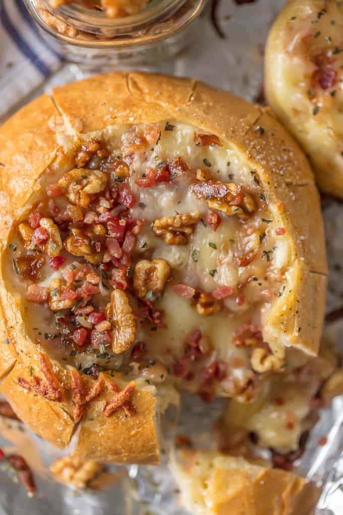 Close up shot of bacon and walnut baked brie