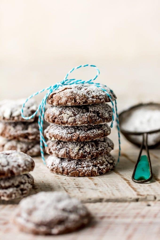 chocolate gooey butter cookies stacked with a string
