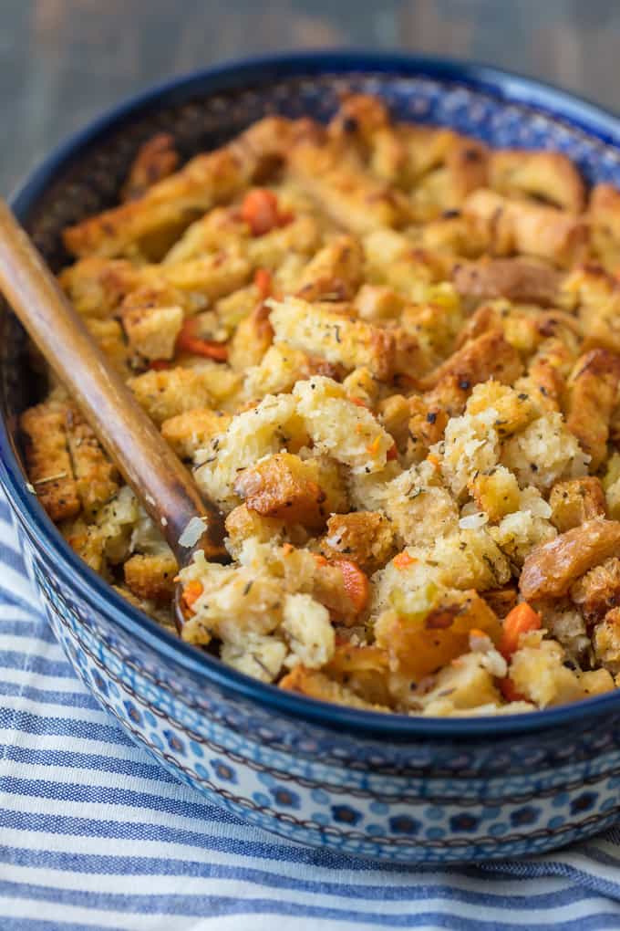 This Turkey Stuffing Recipe is a must make for Thanksgiving and Christmas! Your holiday table wouldn't be complete without Turkey Stuffing and I'm here to show you how to make homemade stuffing! You cannot go wrong with this classic stuffing during the holidays. This Classic Stuffing has so much flavor, crunch, and goodness.