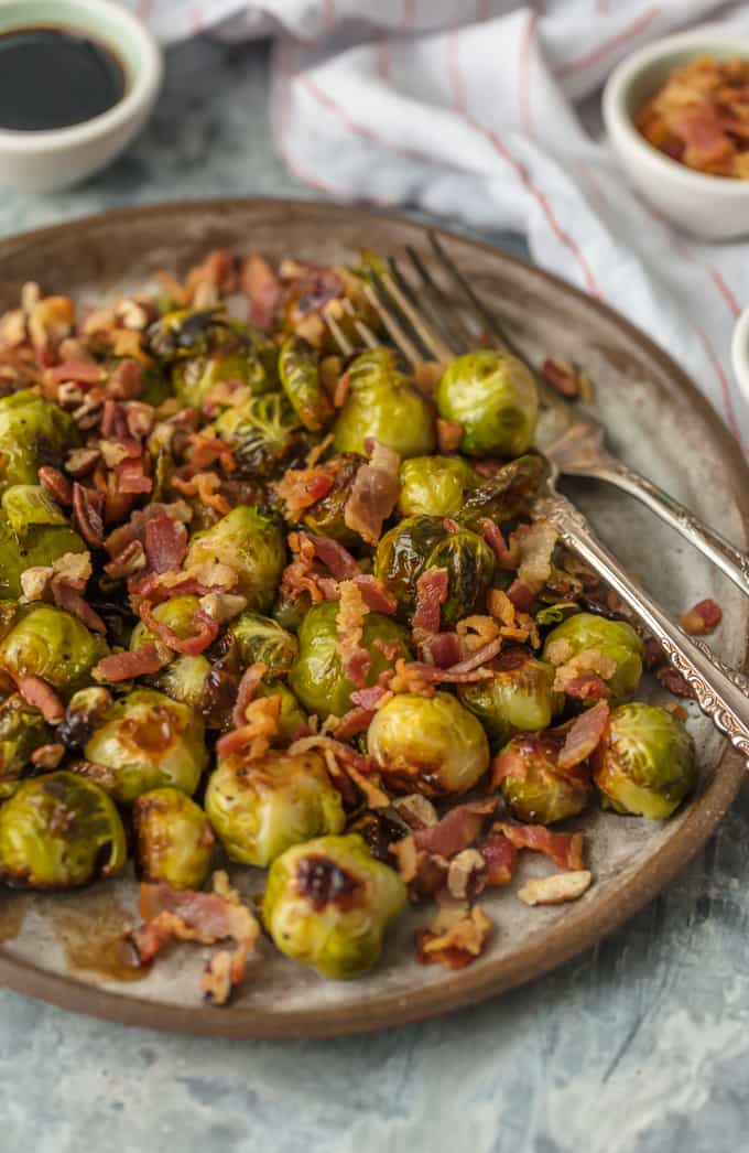 Green Balsamic Brussels Sprouts on a plate with bacon