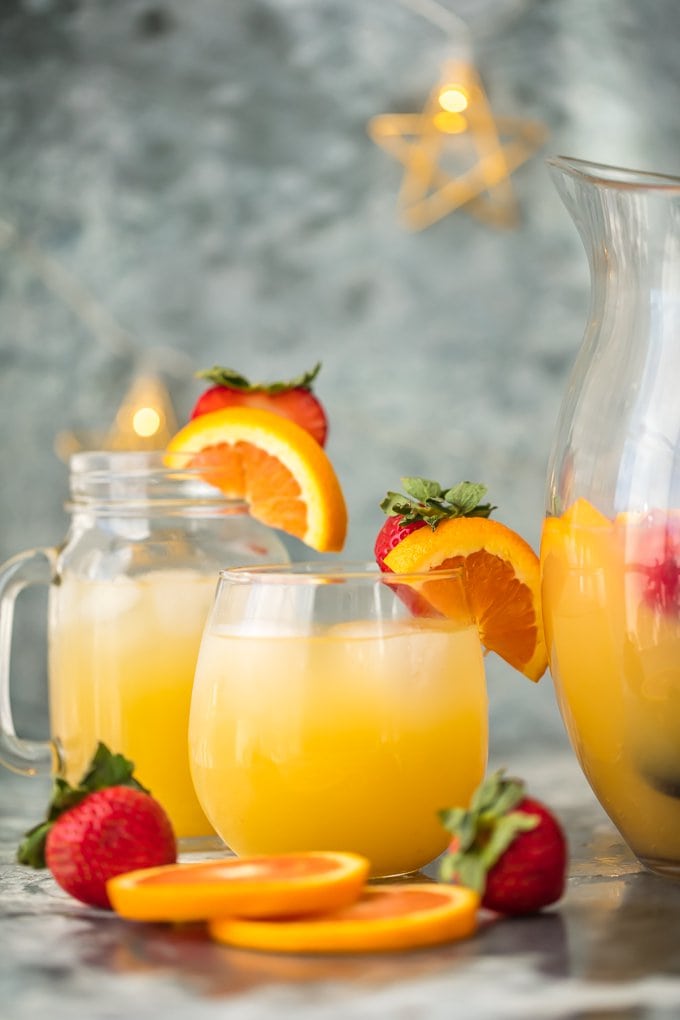 glasses of sangria surrounded by fruit